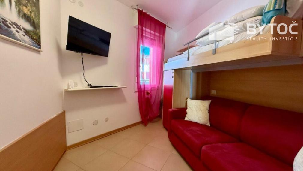 BYTOČ RK - zrekonštruovaný 2-izb. apartmán s terasou a parkovaním v Taliansku - Bibione